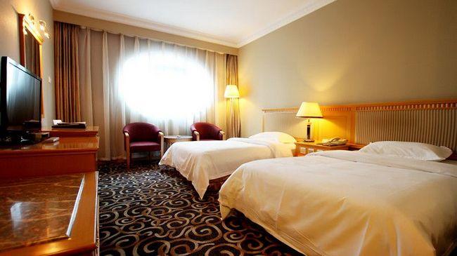 Modern Hotel Harbin Chambre photo